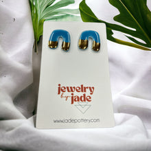 Load image into Gallery viewer, Porcelain arch studs hand made 22k gold detail