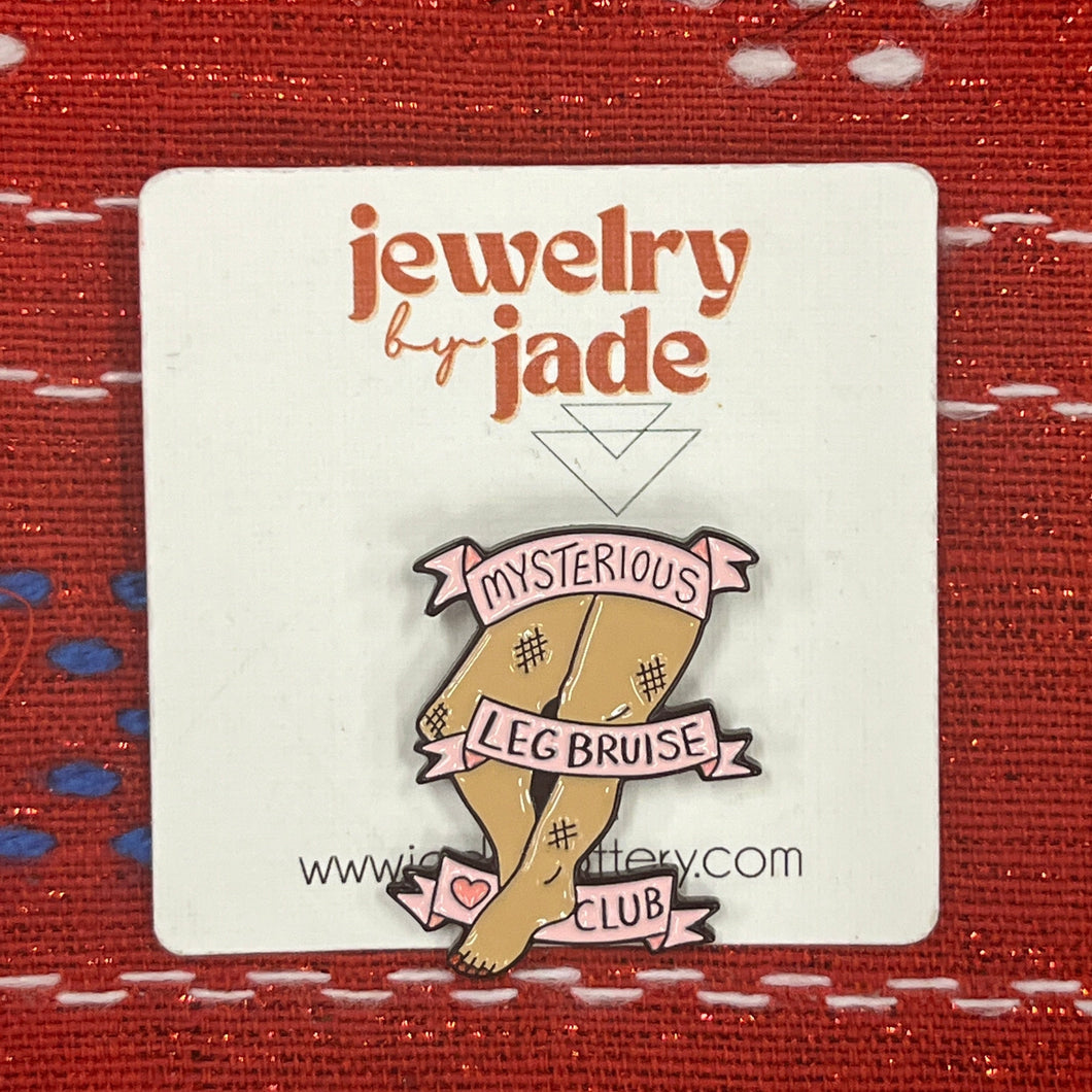 mysterious leg bruise club funny retro 90's style enamel pin